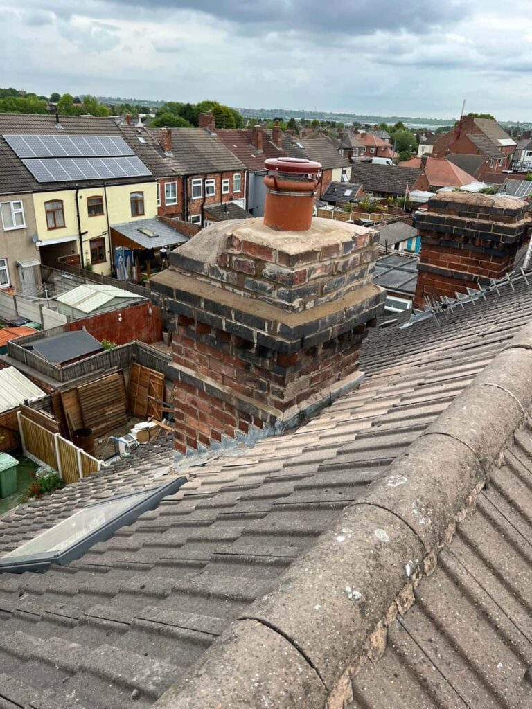 This is a photo taken from a roof which is being repaired by Biggin Hill Roofing Repairs, it shows a street of houses, and their roofs